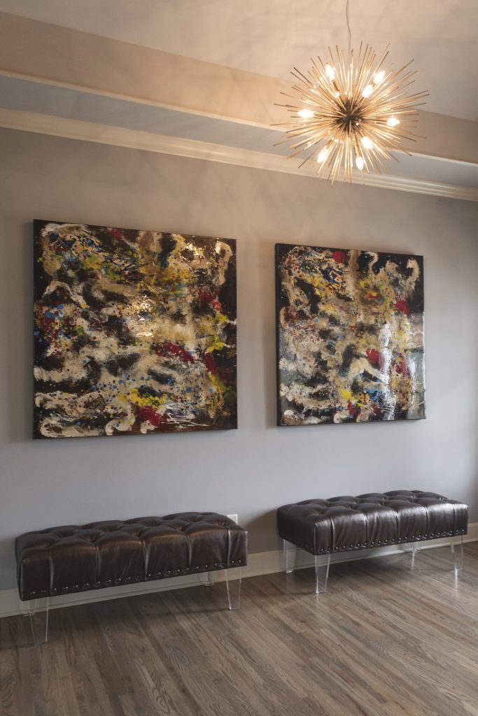 Watersedge Interior Decorator Kansas City 1 Dapper Latino Pictured Above After Pic Artwork Cur Inventory Lucite Legged Benches Homegoods Helios Chandelier Z Gallerie